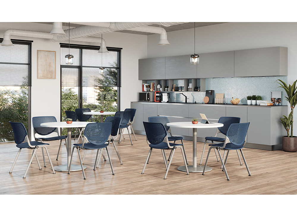 Breakroom, dining room, cafe with blue and grey seating and circle tables