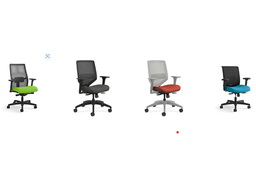 Mesh back task chairs with green, red and aqua accent color seats